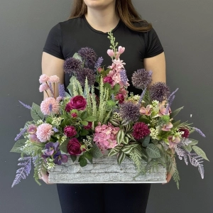 Jesienna kompozycja z wrzosami w donicy